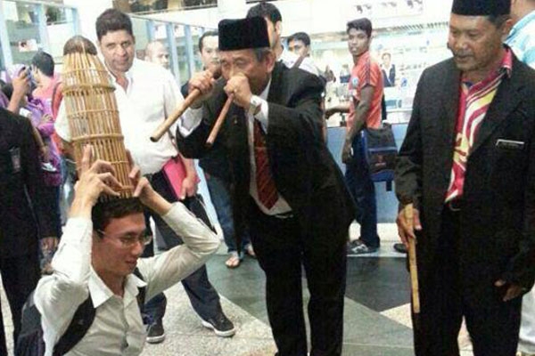 Image result for bomoh pray for  MH370
